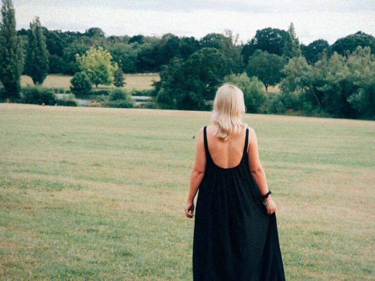 Lucie walking into the distance to signify gratitude and the law of attraction