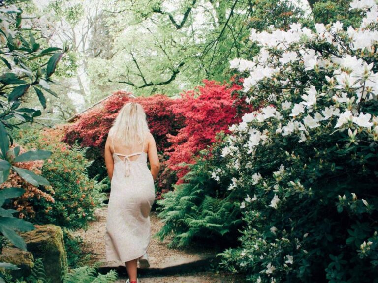 Lucie walking upwards in a garden to signify keeping up with trends