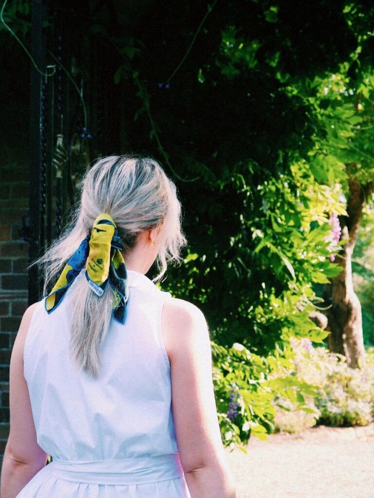 Lucie walking away, signifying how she's getting 1% better every day after losing herself